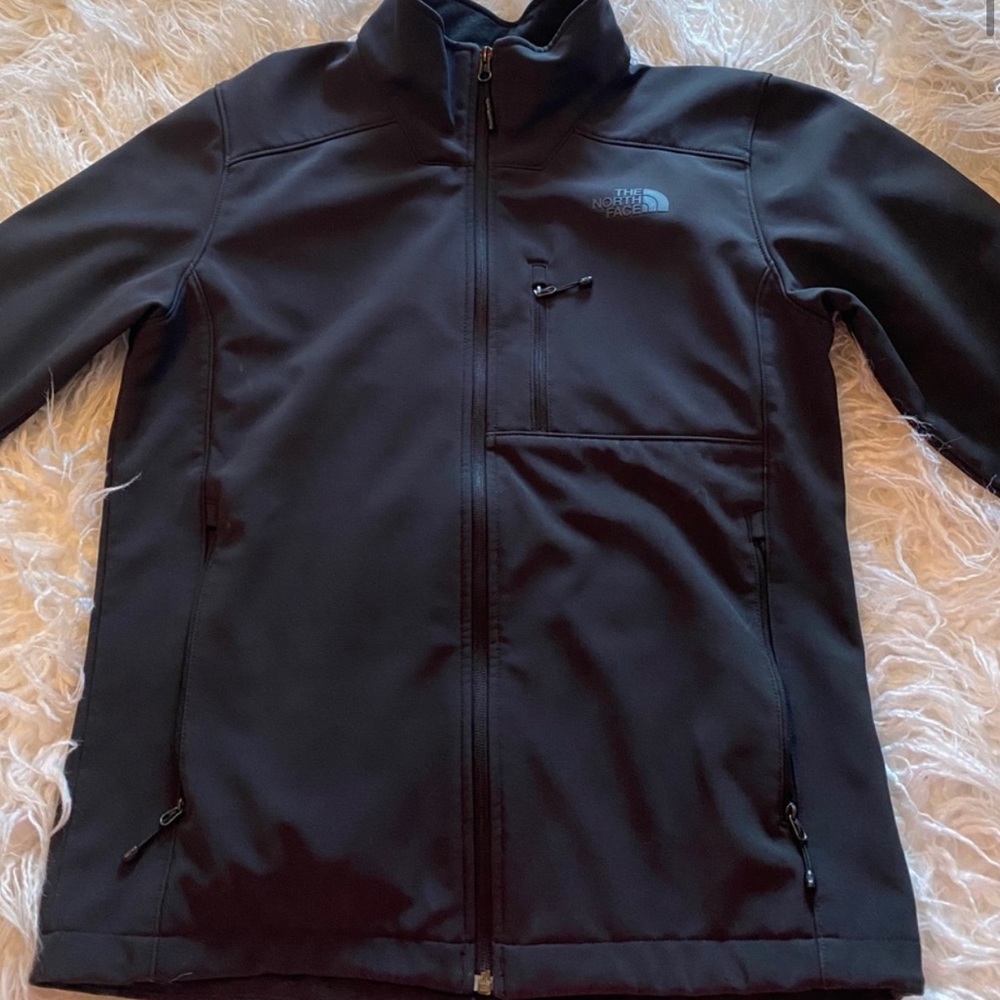 The North Face black men’s jacket